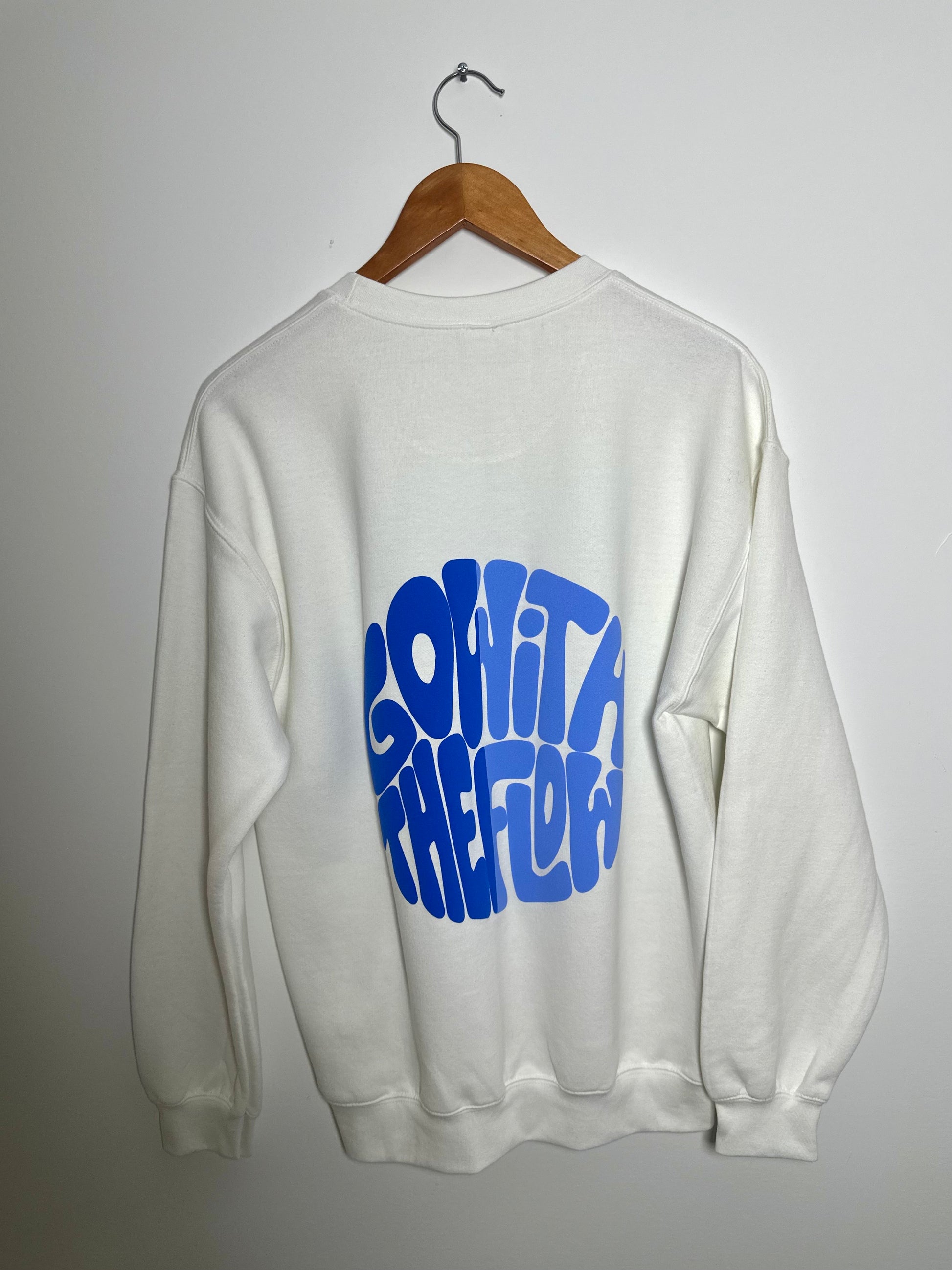 GO WITH THE FLOW SWEATER